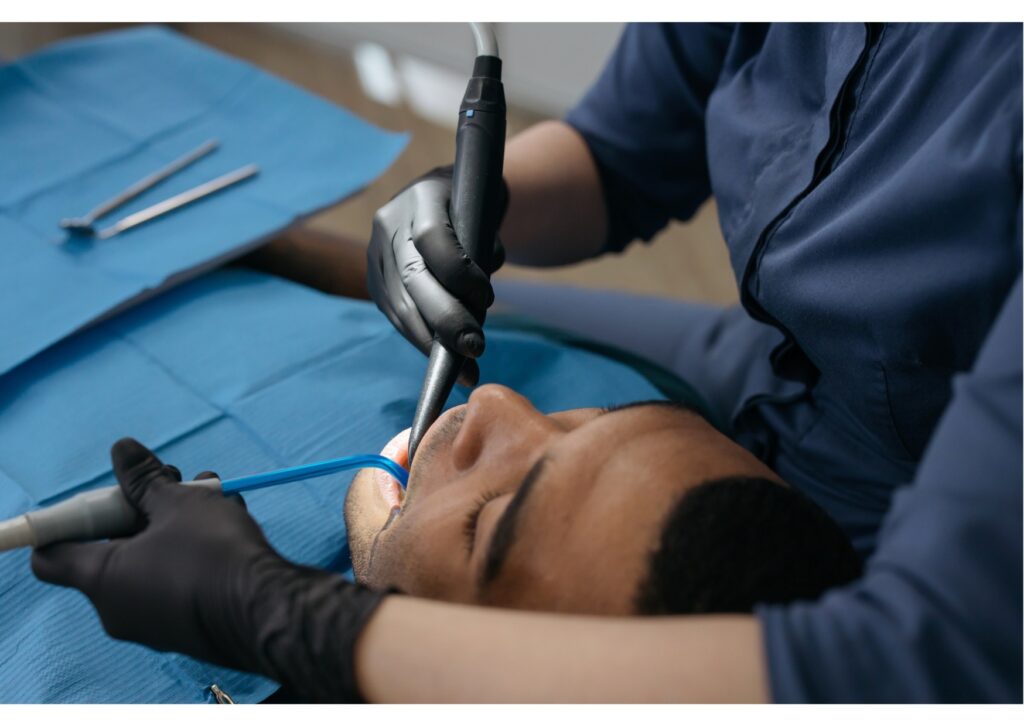 Dentist performing a dental implant procedure to restore a missing tooth and improve oral function